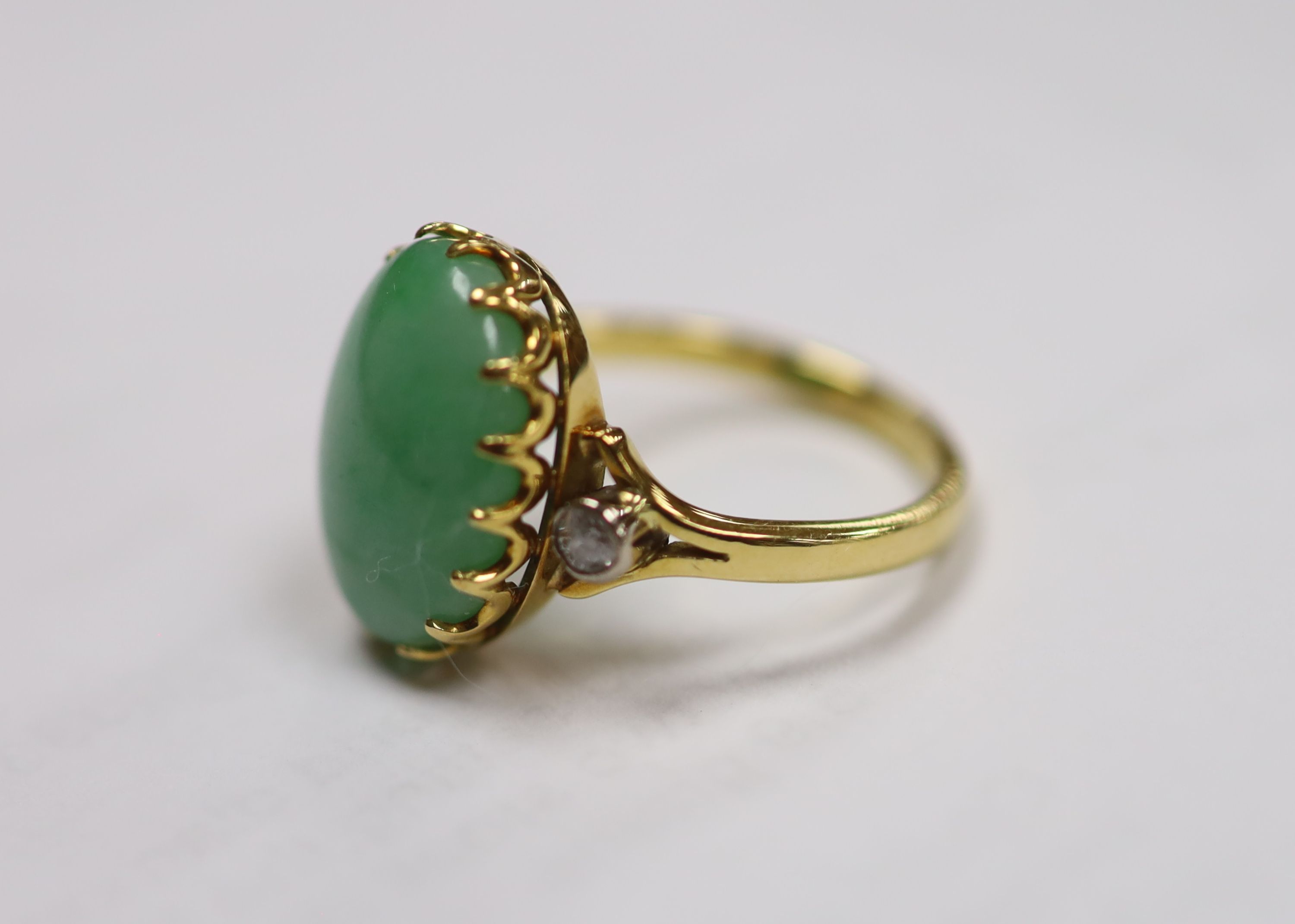 A jade and diamond dress ring, 18ct yellow gold setting